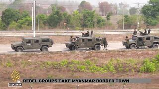 Rebel groups take Myanmar border town_ Hundreds of refugees escape to Thailand.