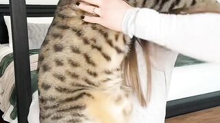 Girl holding joint cat
