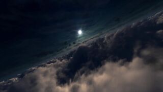 Flight through clouds towards the bright full moon - adalinetv