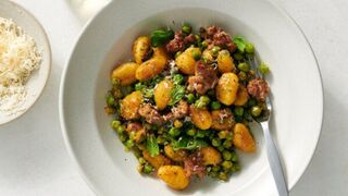 This quick skillet dinner -- Crisp Gnocchi With Sausage and Peas.