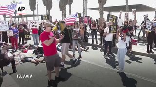 Relatives of Israeli hostages protest outside US Embassy in Tel Aviv.