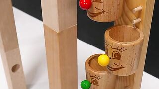 Clown rolling balls