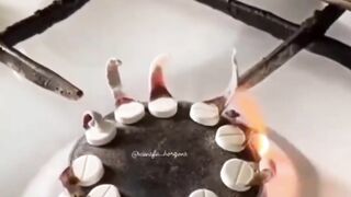 A video clip shows pills burning on the stove, which turns out to be calcium gluconate
