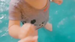 Splish Splash: Summer Fun with Cute Baby Girl in the Swimming Pool