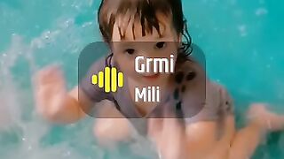 Splashes of Joy: Cute Baby Girl's Poolside Adventure!