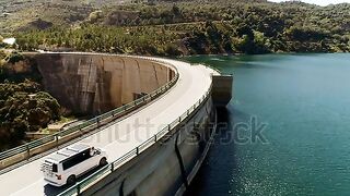 The dam road in the blue waters