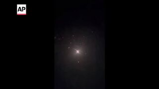 Missiles seen over West Bank as Iran attacks Israel.