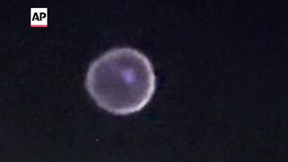 Iranian missiles or drones are intercepted in the sky above Jordan.