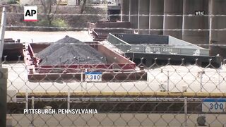 Barges break loose on Ohio River, damaging a marina and striking a bridge.