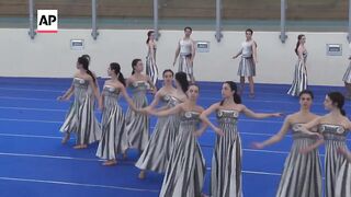 Dancers rehearse ahead of flame lighting ceremony for Paris Olympics 2024.