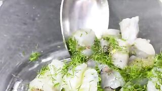 Steamed tiger prawns with its concentrated oil and yuzu vinaigrette