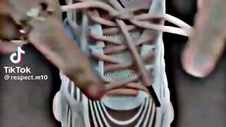 Tie a shoe