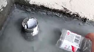 Draining the water with bottle and vacuum.