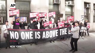 Protesters and supporters of Donald Trump stage outside New York court for start of jury selection.