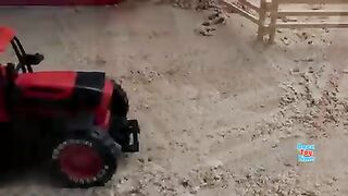 In the sandbox ,Farm animal toys