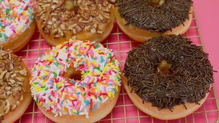 Glazed donuts in a close view - adalinetv