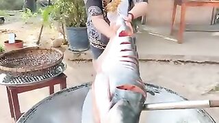 Tasty fry big fish and cook