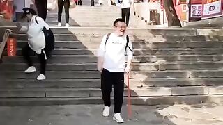 They climbed the 7,200 steps up Taishan Mountain