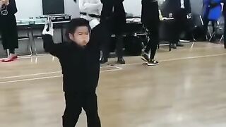 At what age did he begin to practice nunchucks?