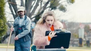 Pretty girl throws a million dollars in the trash