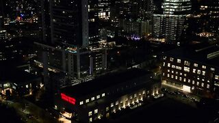 Big city at night from an aerial shot - adalinetv