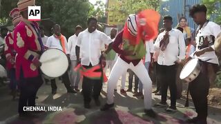 Colorful roadshows and rallies mark election campaigns in India ahead of polls.