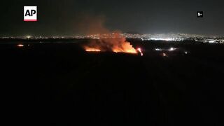 Firefighters in Mexico battle forest fires amid record-breaking heat wave.
