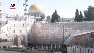 Prayer notes removed from Jerusalem's Western Wall ahead of Passover holiday.