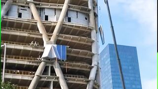 Massive Heavy Excavator Lifted Totaly In The Air With Tower Crane