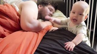 Daughter waking up her dad to tell him her first words