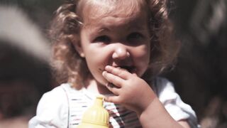 "Childhood Joy: Radiant Smiles"