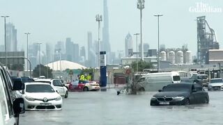 Dubai streets still flooded as authorities scramble to clean