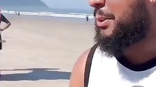 Couple get a free drawing at the beach, lady gets a good laugh.