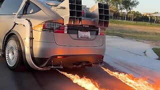 The world’s first fire-breathing Tesla… #backtothefuture #