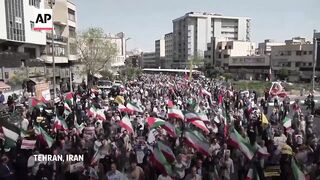 Worshipers in Iran chant 'death to Israel' hours after suspected drone attack.