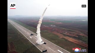 North Korea says it tested 'super-large' cruise missile warhead and new anti-aircraft missile.