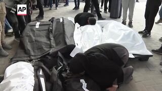 Families mourn their loved ones after two Israeli airstrikes hit Rafah.