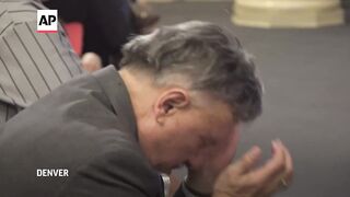 Vigil held for victims of Columbine shooting.