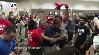 Volkswagen workers in Tennessee cheer after vote to join the United Auto Workers union.