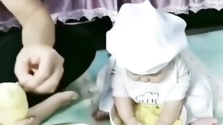 Baby helping