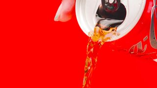 Hand holds a can while pouring coke - adalinetv