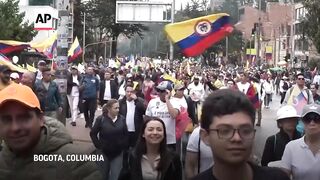 Tens of thousands of Colombians protest against the leftist president's reform agenda.