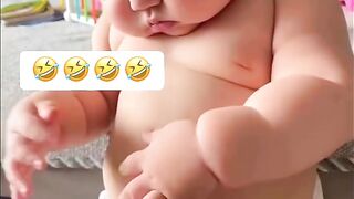 baby playing belly