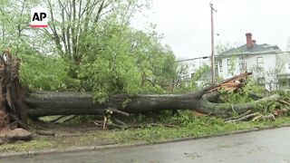 Hail storm sweeps through South Carolina, leaving damaged houses and cars.