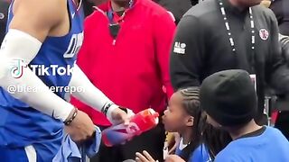 wholesome video of brodie checking in on his kids at halftime