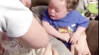 Big brother meets lil sis for the first time