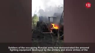 Russian servicemen show the burning, destroyed equipment and trucks in Ukrainian steppes