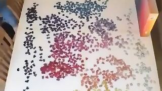 A 5000 piece puzzle in 35 seconds which took 35 hours and 29 mins to complete