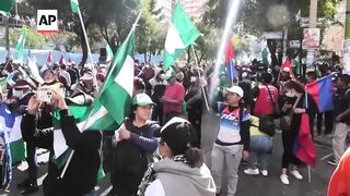 Protesting teachers clash with police in Bolivia.