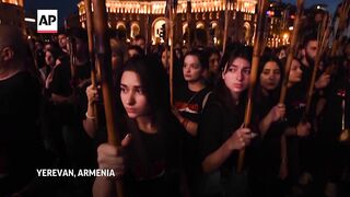 Torchlit march held in Yerevan to mark mass deaths of Armenians.